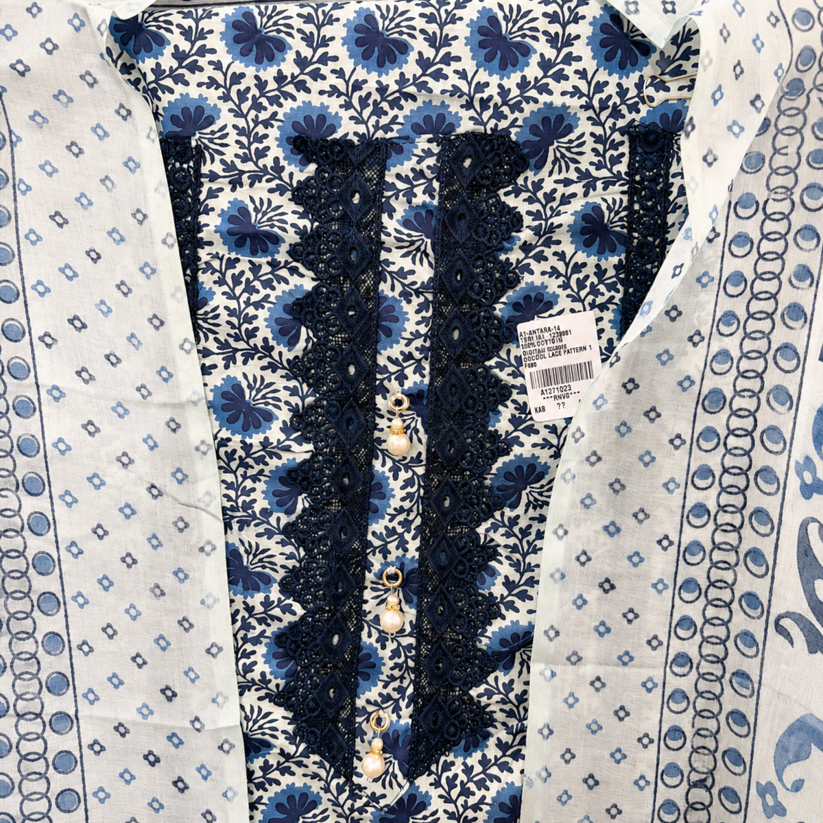 Ocean Breeze: Blue & White Jam Cotton Suit with Intricate Resham Neckline  Product Description